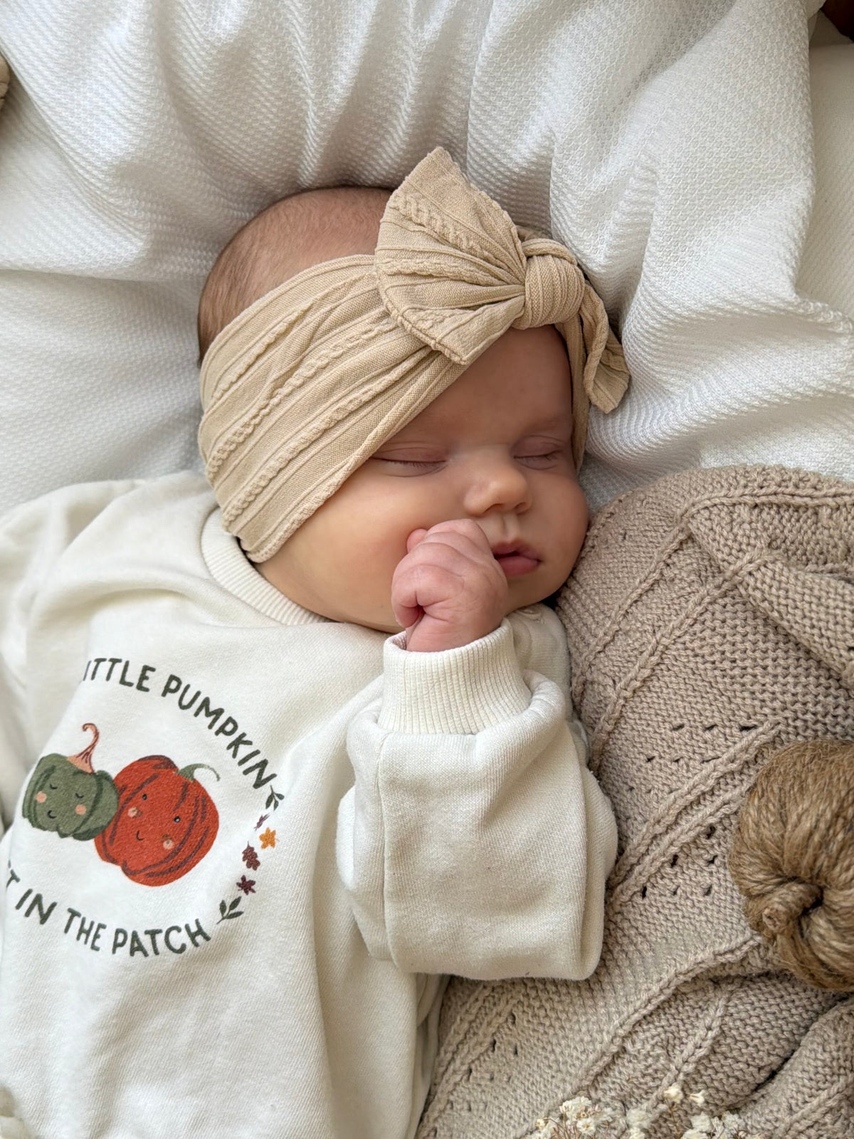 Cable knit bow headband - beige